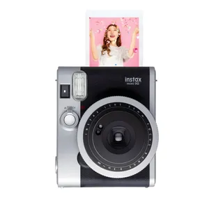 دوربین عکاسی چاپ سریع فوجی فیلم مدل Instax mini 90 Neo Classic همراه با یک بسته فیلم 10 تایی