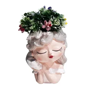 گلدان به همراه گل مصنوعی مدل دختر صدفی