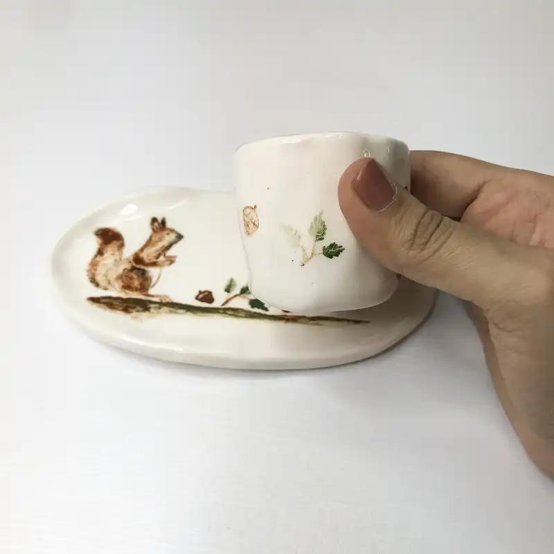 ست فنجان و زیر لیوانی سرامیکی طرح سنجاب