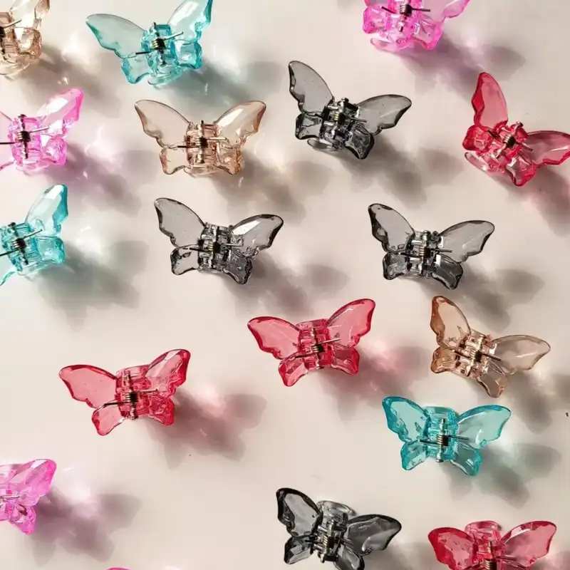 کلیپس مو زنانه مدل پروانه کریستالی طرح شیشه ای