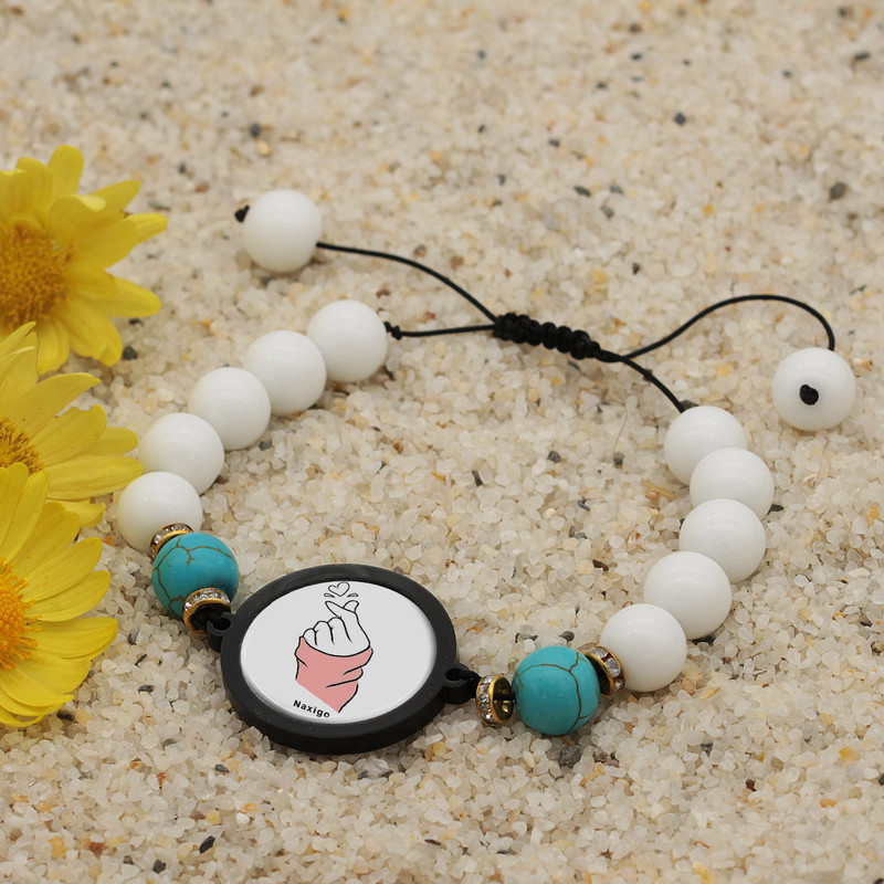 دستبند زنانه ناکسیگو طرح دست و قلب کد BR4352