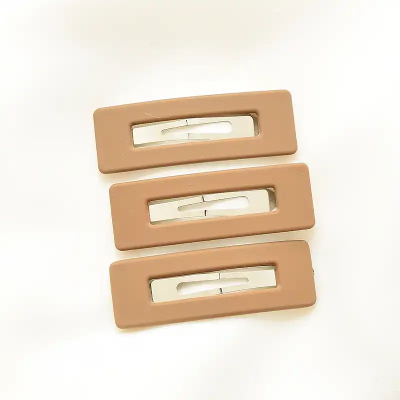 گیره مو زنانه مدل تق تقی روکش دار مستطیلی کد gh بسته 3 عددی