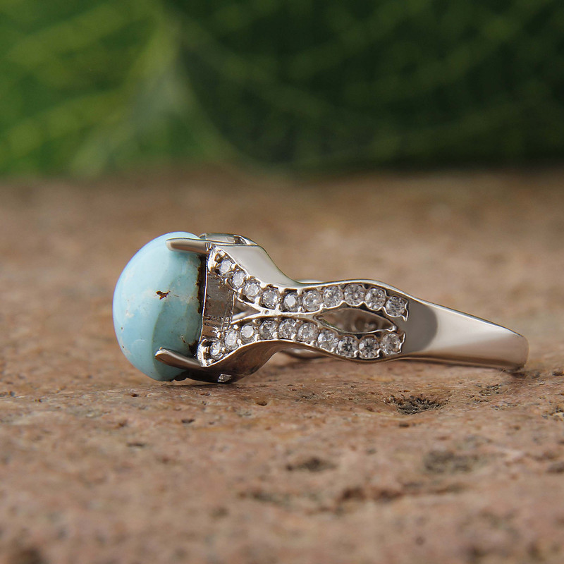 انگشتر نقره زنانه بازرگانی میلادی مدل سنگ فیروزه طبیعی نگین برلیان بدون ریزش آبکاری رادیوم کد AWR_1597