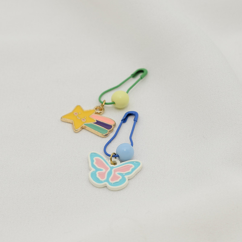 سنجاق سینه دخترانه دلنار گالری مدل ستاره و پروانه بسته 2 عددی