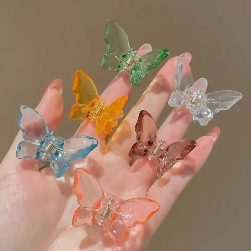 کلیپس مو زنانه مدل پروانه کریستالی طرح شیشه ای