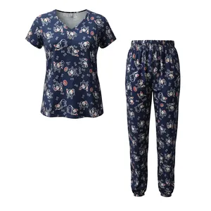 ست تی‌شرت آستین کوتاه و شلوار راحتی زنانه مدل مچ کش دار طرح عروسکی کد Pa0167-1