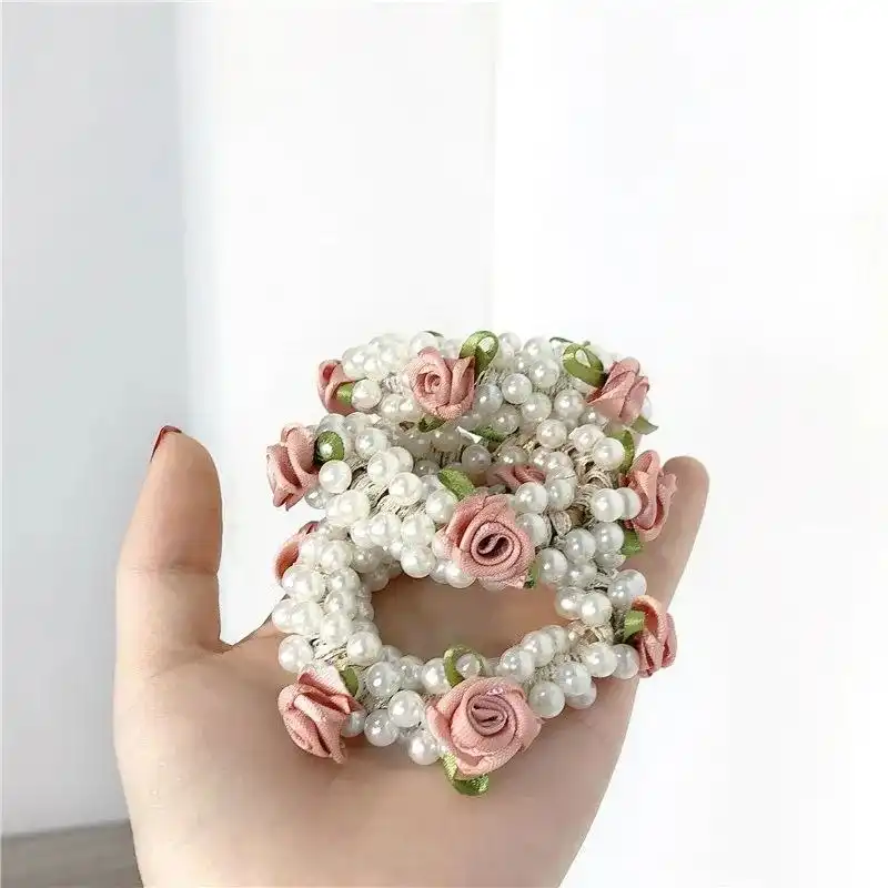 کش مو زنانه مدل مرواریدی گل دار