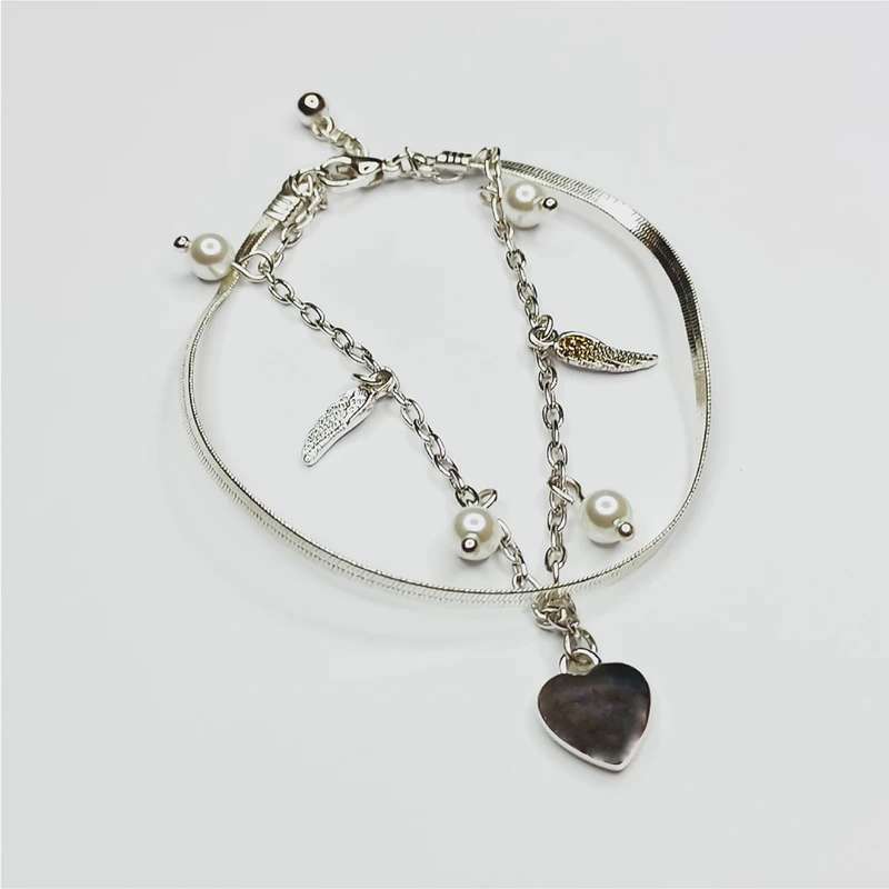 دستبند زنانه اکسسورایز مدل قلب و بال کد P69