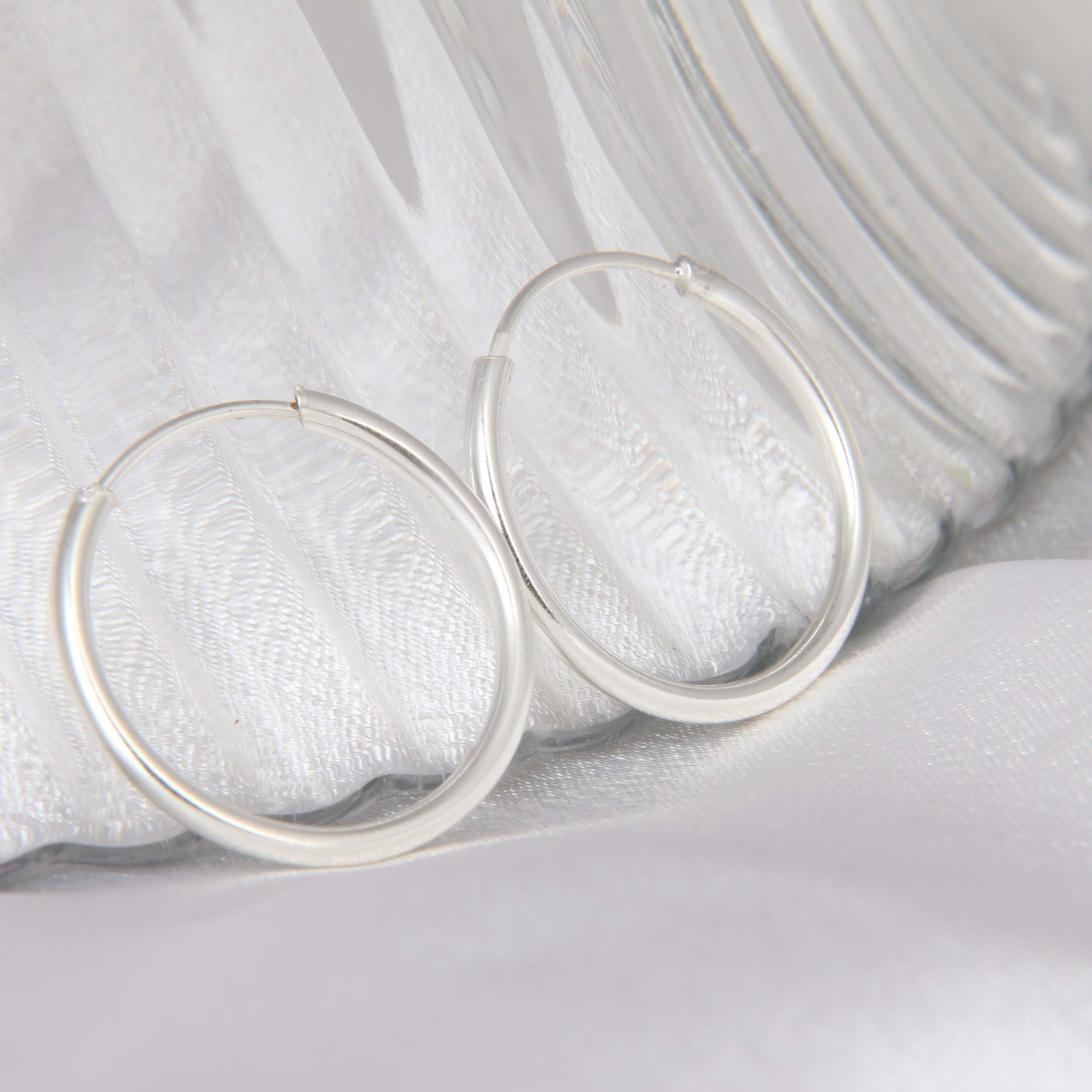 گوشواره نقره زنانه بازرگانی میلادی مدل حلقه ای کد GZN_273 گوشواره نقره زنانه بازرگانی میلادی مدل حلقه ای کد GZN_273