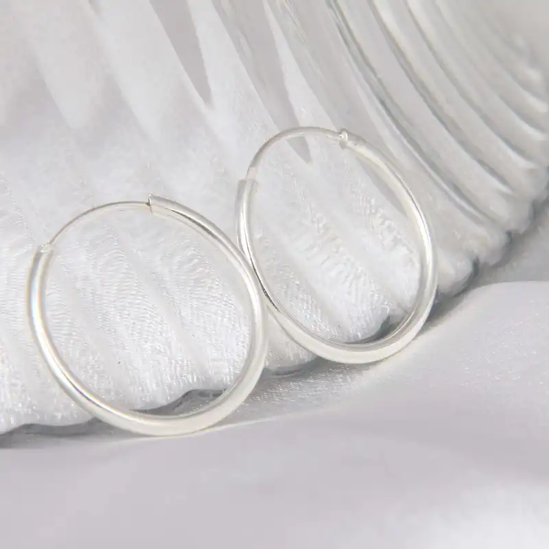 گوشواره نقره زنانه بازرگانی میلادی مدل حلقه ای کد GZN_273