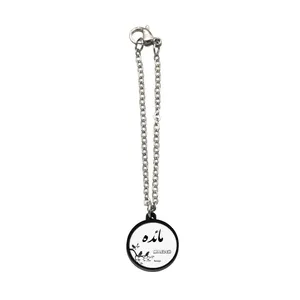 آویز ساعت زنانه ناکسیگو مدل شب تاب طرح مائده کد AW9067