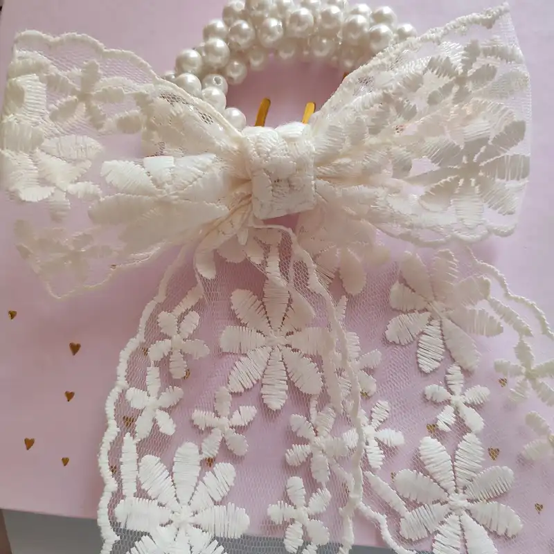 کش مو زنانه مدل مرواریدی دنباله دار