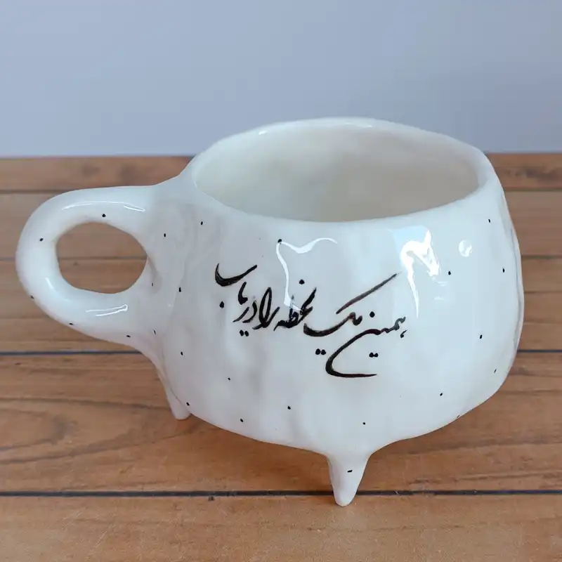 ماگ  سرامیکی طرح دفرمه مدل شعرنوشته