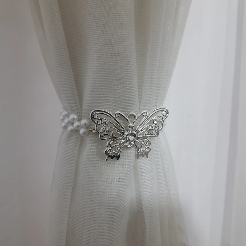 عکس شماره 5 : پرده جمع کن مدل پروانه