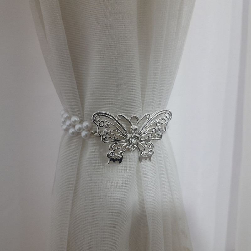 پرده جمع کن مدل پروانه