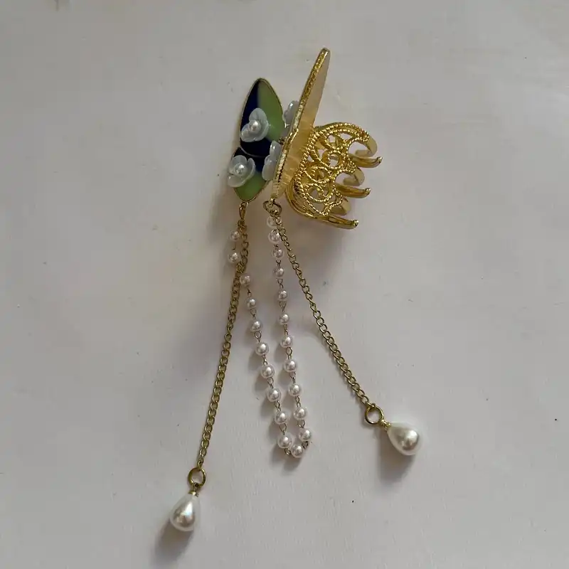 کلیپس مو زنانه مدل فلزی طرح پروانه