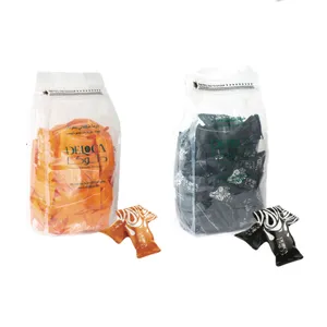  خرما شکلاتی پرتقالی و تلخ با مغز بادام دلوکا - ۵۰۰ گرم بسته 2 عددی