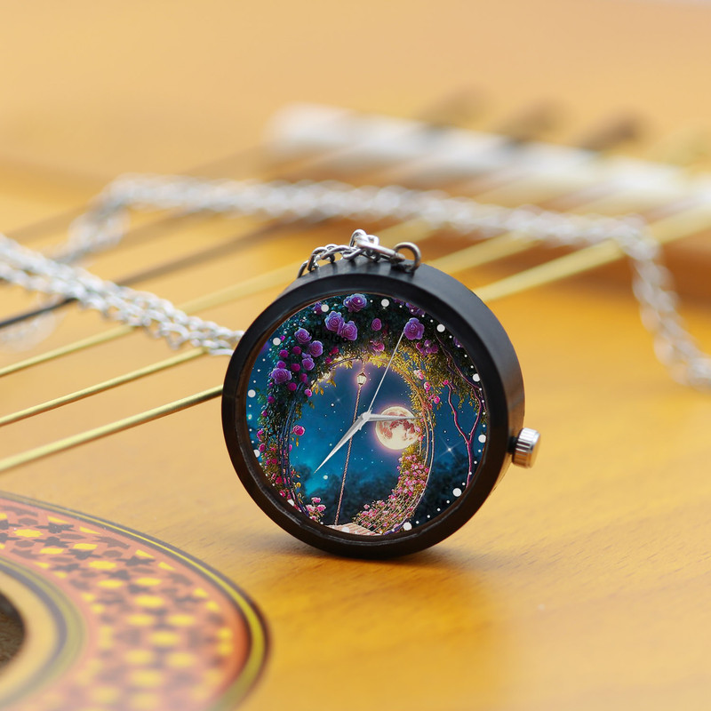 ساعت گردنبندی عقربه ای ناکسیگو مدل گل کد NF12783 ساعت گردنبندی عقربه ای ناکسیگو مدل گل کد NF12783