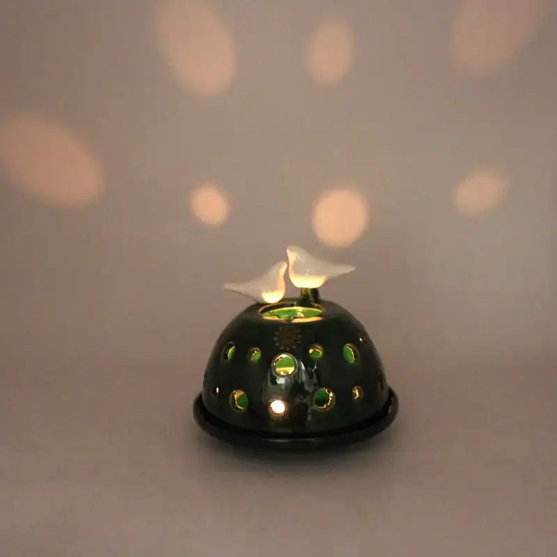 شمعدان سفالی طرح پرنده