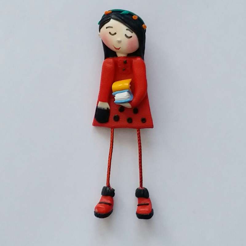 گل سینه دخترانه مدل دختر کتاب فروش کد SS115