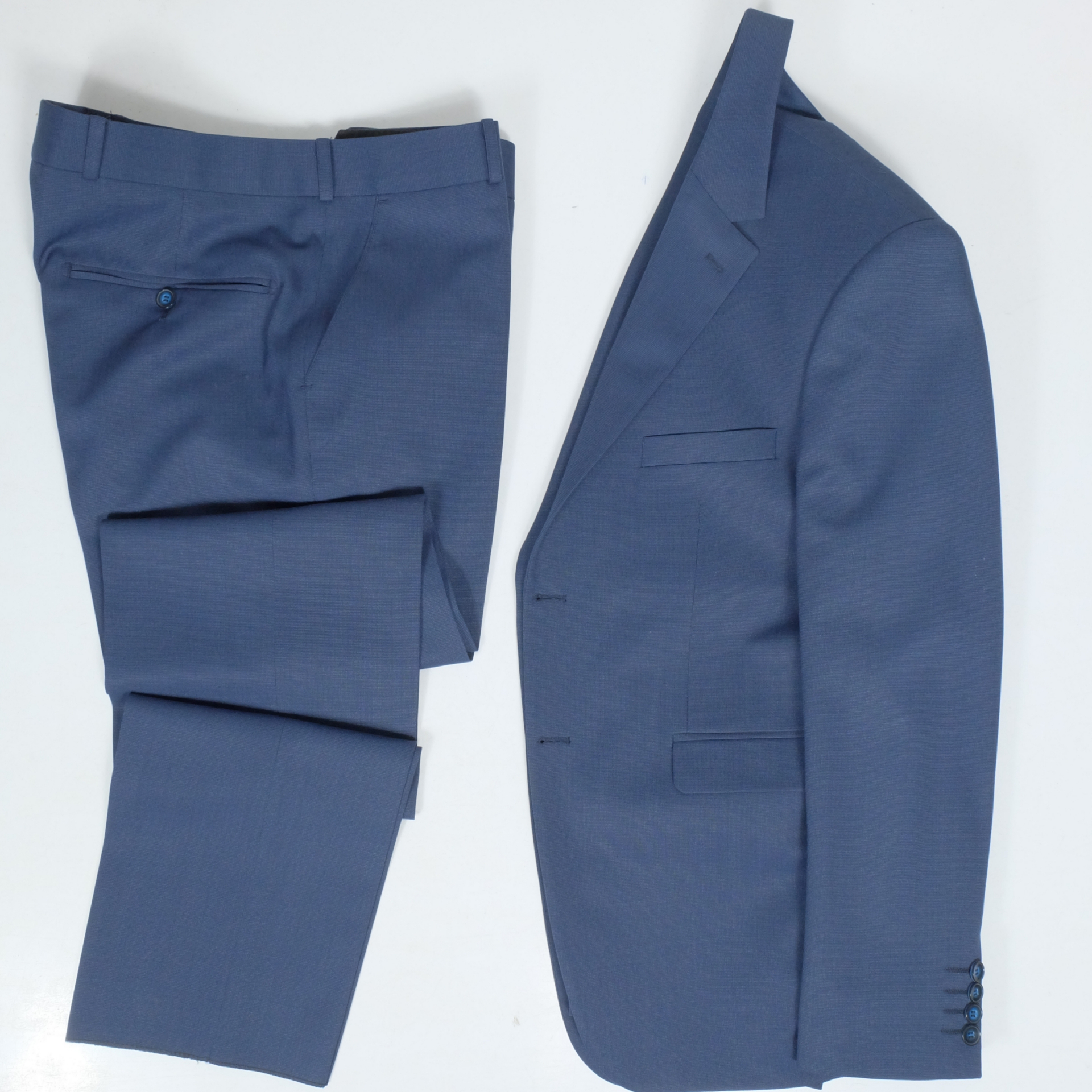 کت و شلوار مردانه مدل فاستونی خاویاری رنگ آبی نفتی