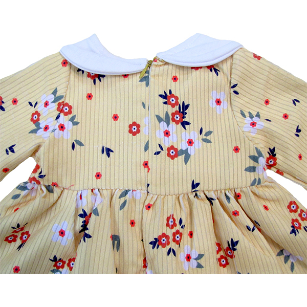 پیراهن نوزادی مدل گلدار رنگ لیمویی