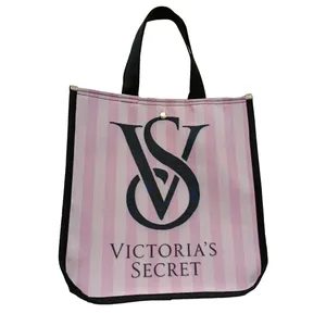 ساک دستی مدل دکمه‌ای طرح راه‌راه