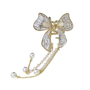 کلیپس مو زنانه مدل پاپیون آویزدار