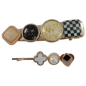 گیره مو زنانه مدل مجلسی فلزی نگین دار مجموعه 2 عددی