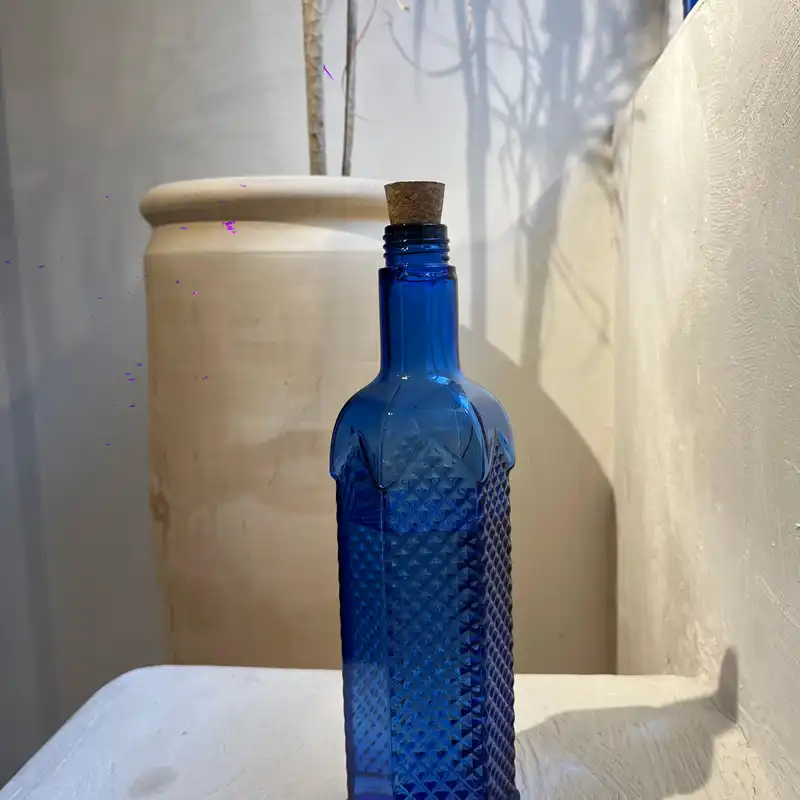 بطری شیشه ای مدل آب خورشیدی شش ضلعی