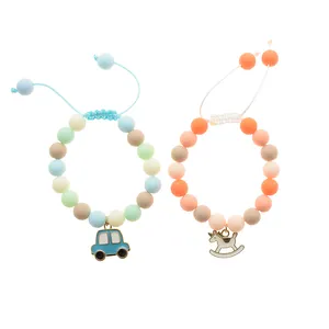 دستبند بچگانه مدل اسب چوبی و ماشین بسته 2 عددی