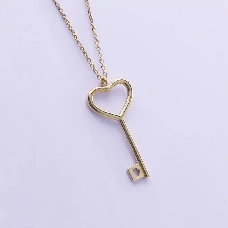 گردنبند طلا 18 عیار زنانه پولک مدل کلید