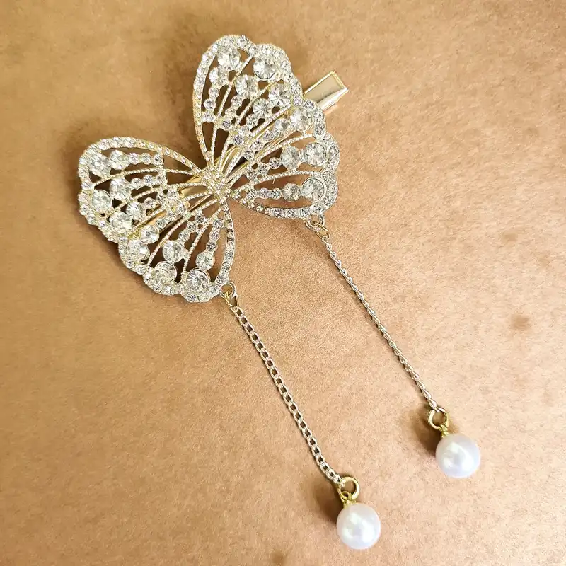 گیره مو زنانه مدل بال پروانه نگین‌دار مجلسی آویزدار کد brg 874