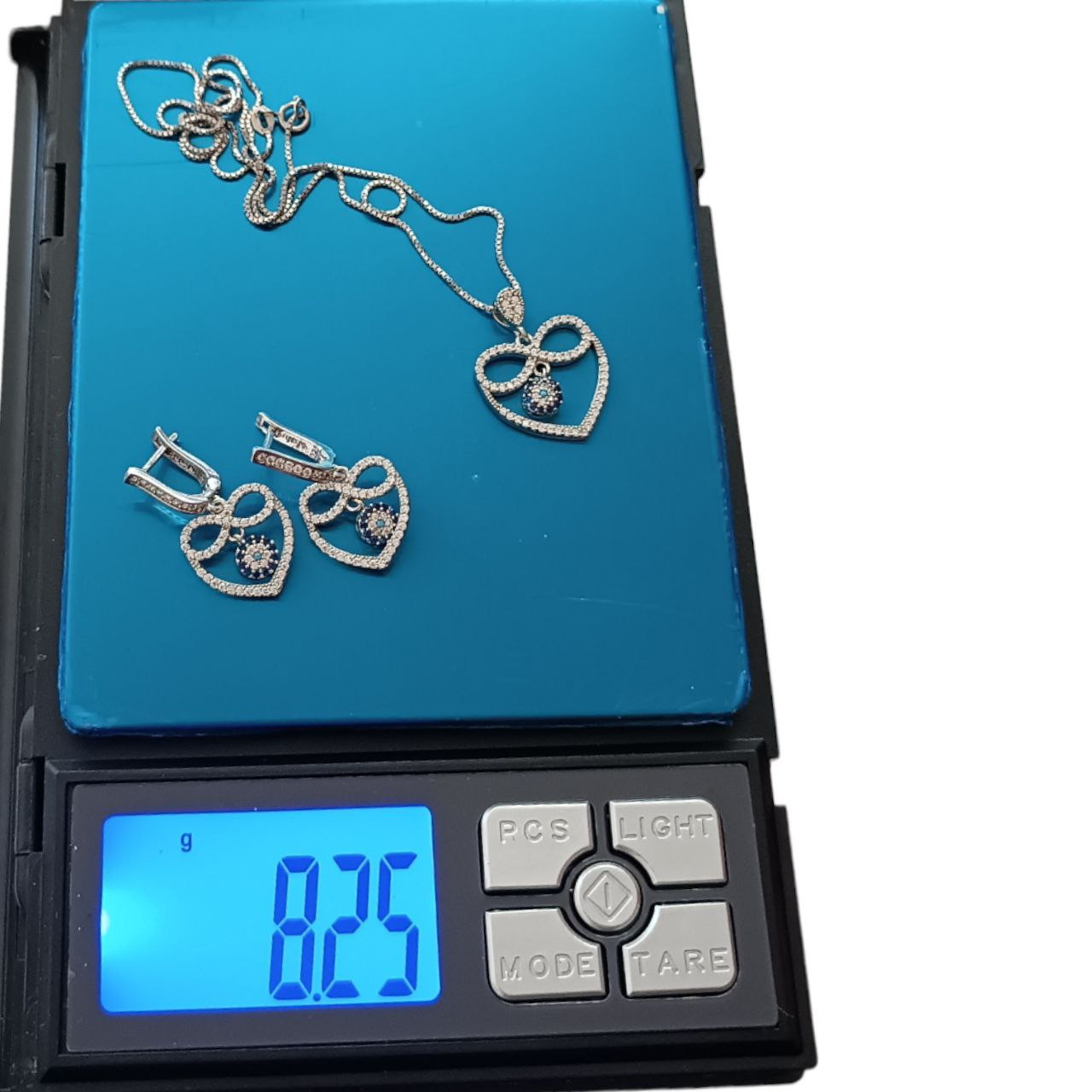 نیم ست نقره زنانه مدل چشم نظر قلب دار