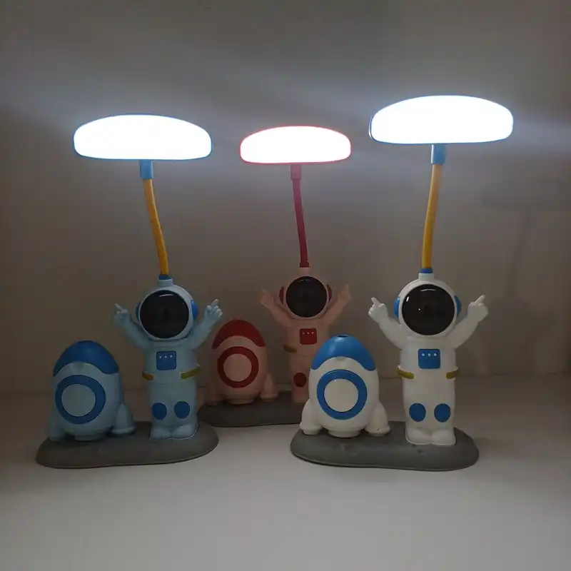 چراغ مطالعه مدل دو حالته طرح فضانورد و موشک به همراه تراش