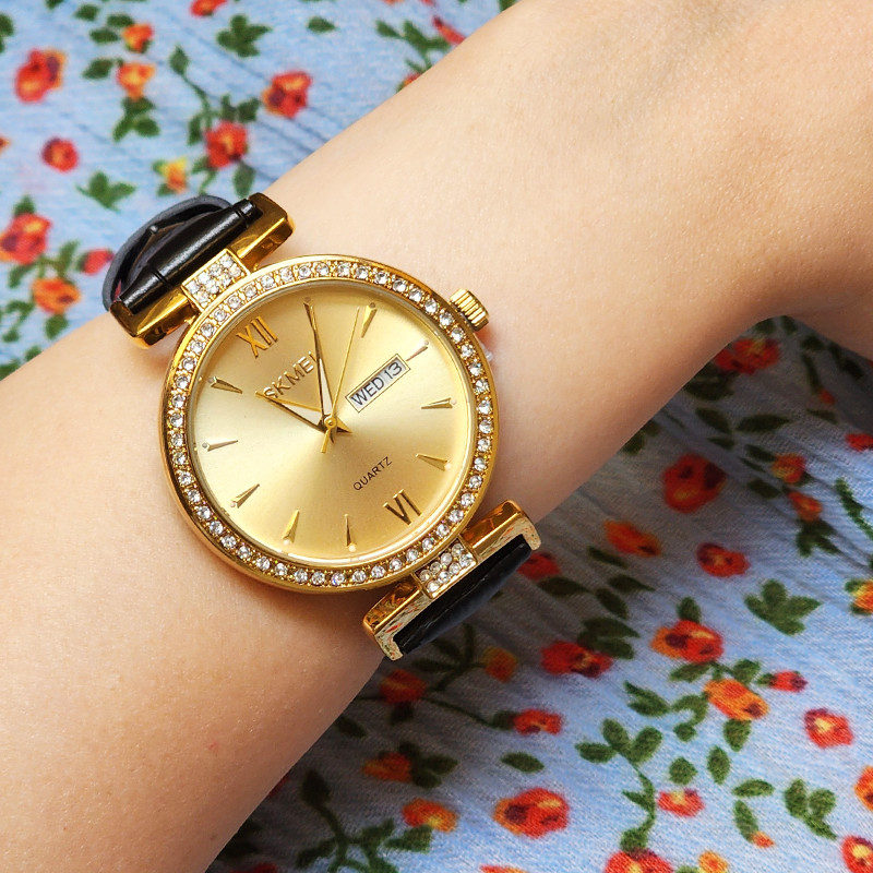 ساعت مچی عقربه‌ای کوارتز زنانه اسکمی مدل 2090GD به همراه دستبند