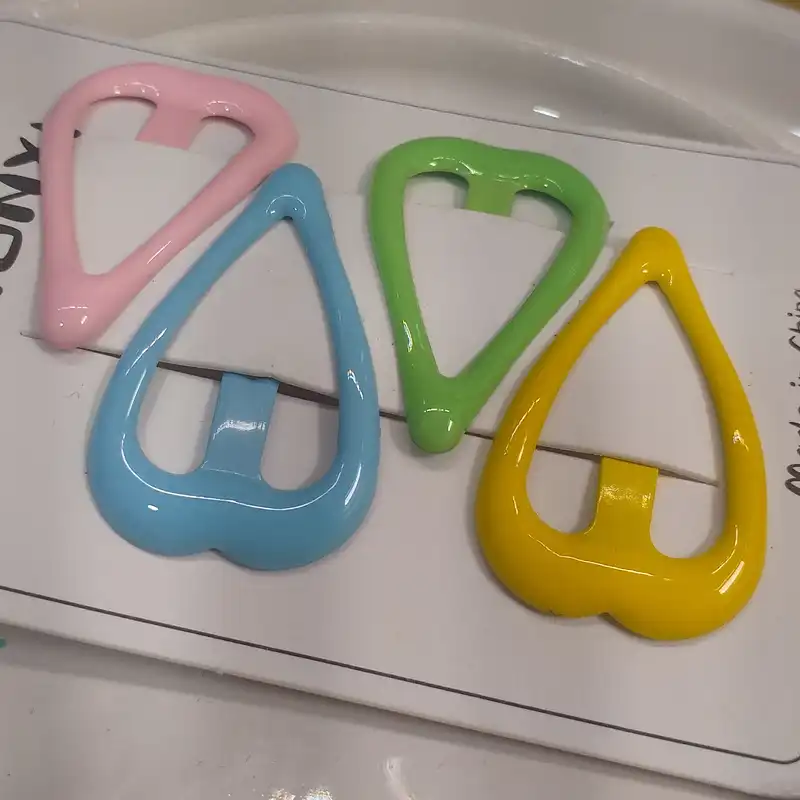 گیره مو زنانه مدل تق تقی قلبی کد kh678 بسته 4 عددی