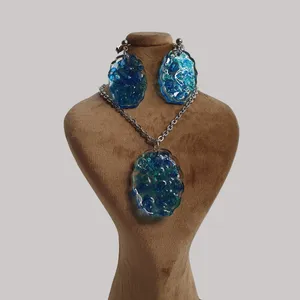 نیم ست زنانه مدل رزین و شیشه طرح دفرمه