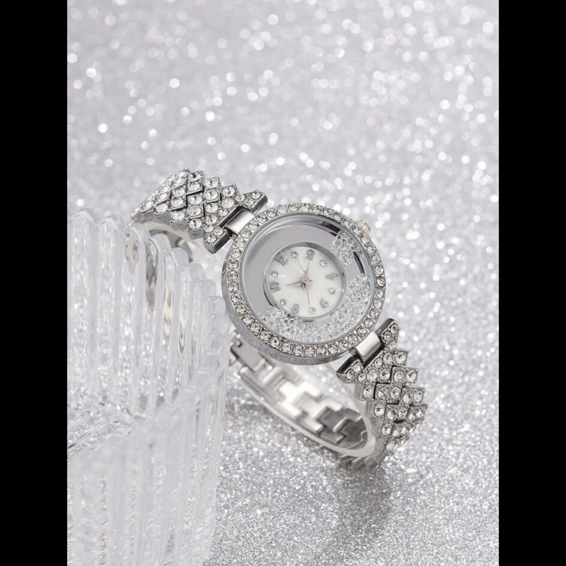 ساعت مچی عقربه ای زنانه مدل دور شنی بند نگینی فول استون 1