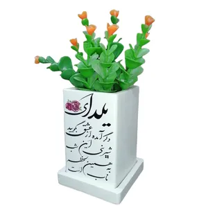 گلدان به همراه گل مصنوعی مدل یلدا 01