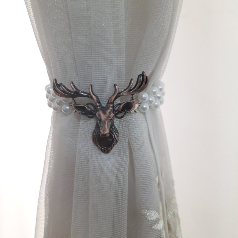 پرده جمع کن مدل گوزن