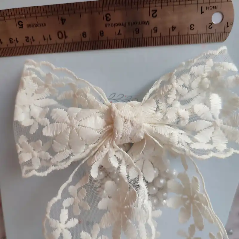 کش مو زنانه مدل مرواریدی دنباله دار